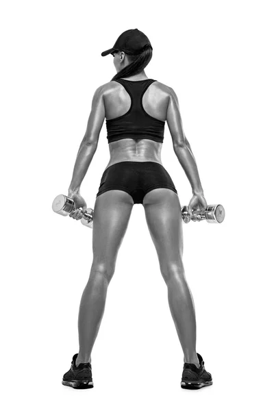 Fitness mujer deportiva en el entrenamiento bombeo de músculos con mancuerna — Foto de Stock