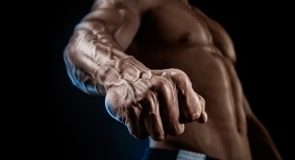 Close-up of athletic muscular arm and torso — Stock Photo, Image