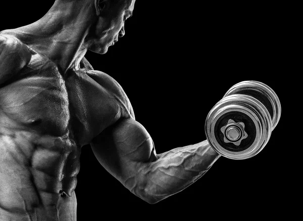 Strong and power bodybuilder doing exercises with dumbbell — Stock Image Strong and power bodybuilder doing exercises with dumbbell Royalty Free Stock Images