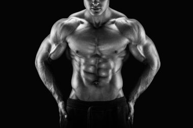 Handsome and young power athletic man with great physique clipart