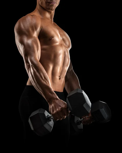 Close-up of athletic man pumping up muscles with dumbbell — Stock Photo, Image