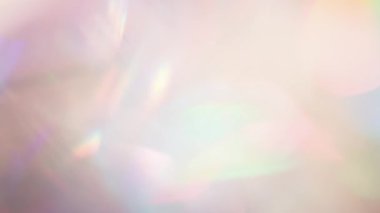 Peach Tone 'da canlı titreşimler. Döngü. Parlak yanardöner ışıklar ve parıltılar çok yönlü kristal içinde dönen hareketle oluşur.