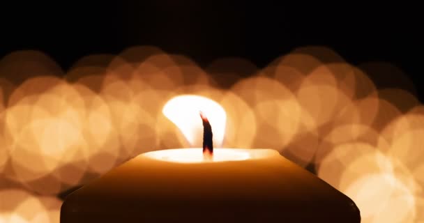 Dramatic Fluttering Candle Flame Large Candle Close Background Set Blurry — Stock Video