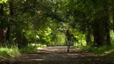 boy runs towards shaded alley