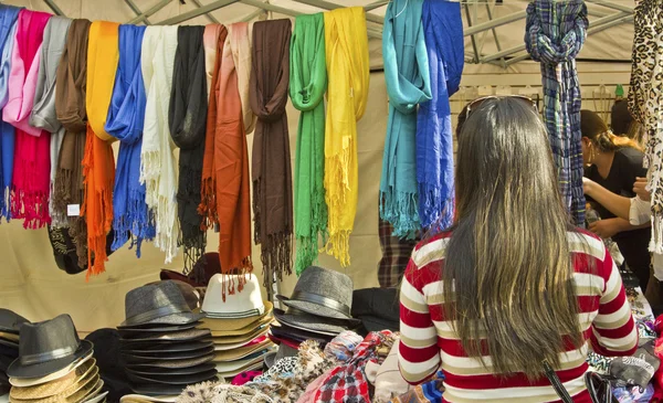 Woman choose products in a street market fair — Stock Photo, Image