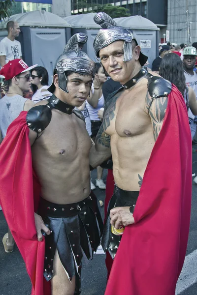 Two persons wearing costumes in Pride Parade Sao Paulo — Stock Photo, Image
