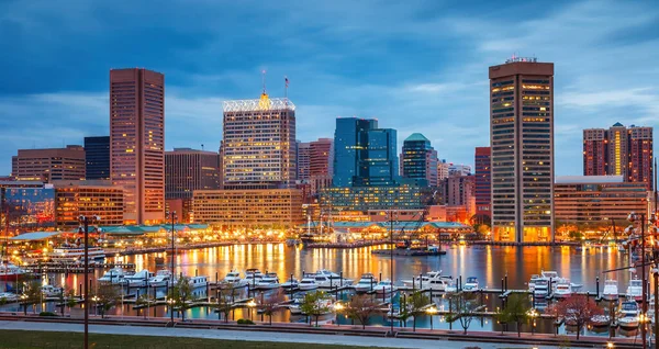 View on Baltimore skyline and Inner Harbor from Federal Hill at dusk Royalty Free Stock Images