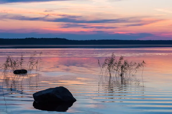 Sunset on a lake — Stock Photo, Image