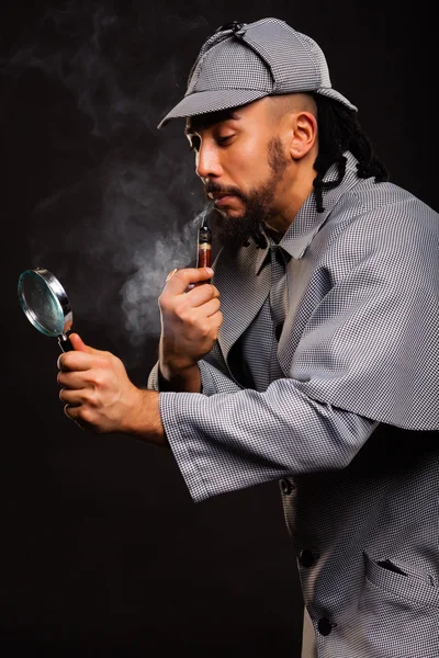 Sherlock Holmes with pipe and magnifying glass