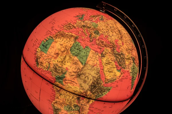 Terrestrial globe on black background — Stock Photo, Image
