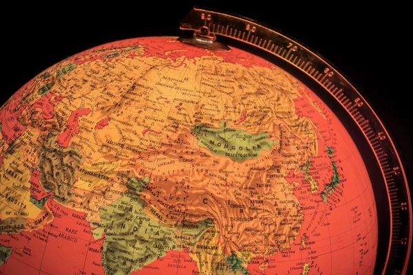 Terrestrial globe on black background — Stock Photo, Image