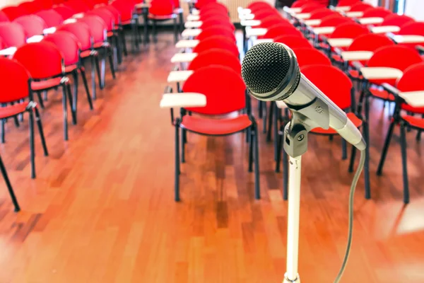 Close up of microphone in conference room — Stock Photo, Image