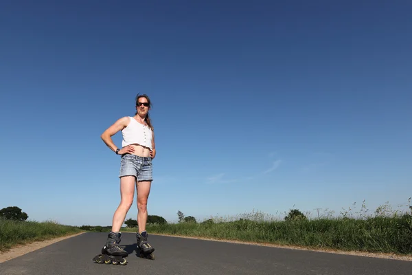 Young Rollerblading woman — Stock Photo, Image