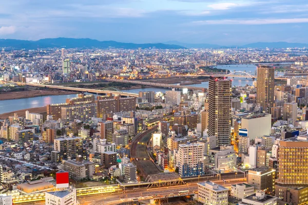 Osaka panoramatu budovy při západu slunce — Stock fotografie