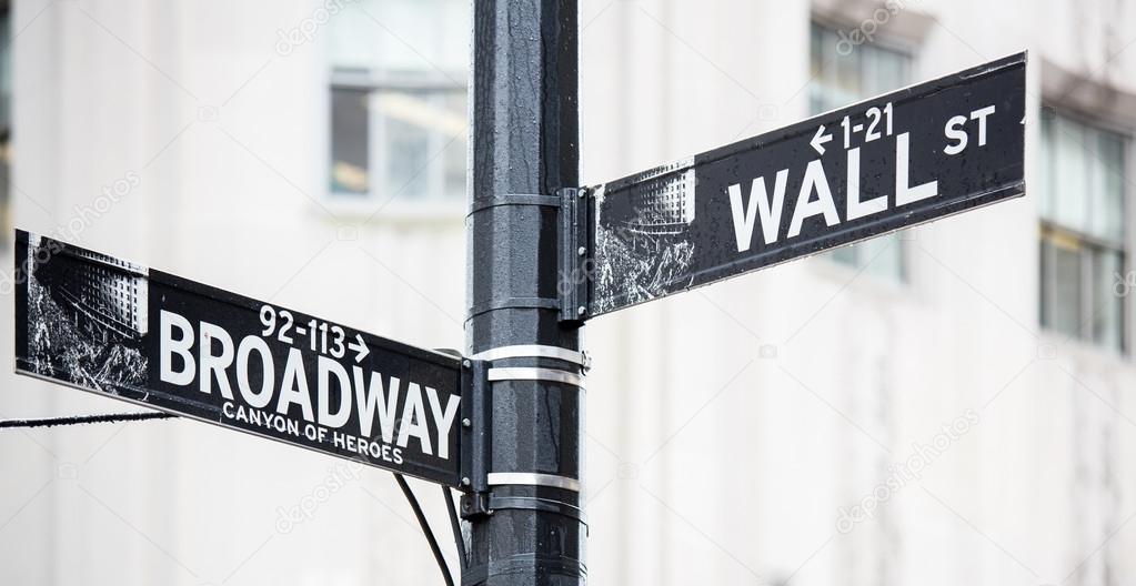 Wall street and broadway sign
