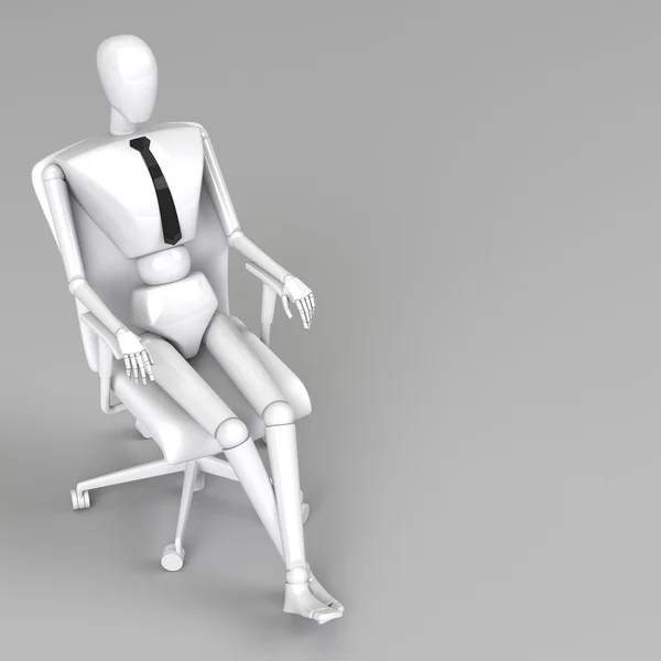 Businessman doll is sitting on chair — Stock Photo, Image