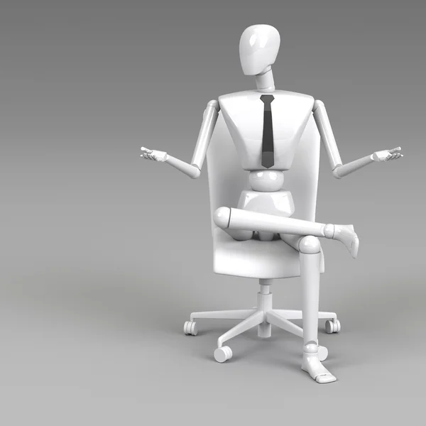 Businessman doll is sitting on chair — Stock Photo, Image