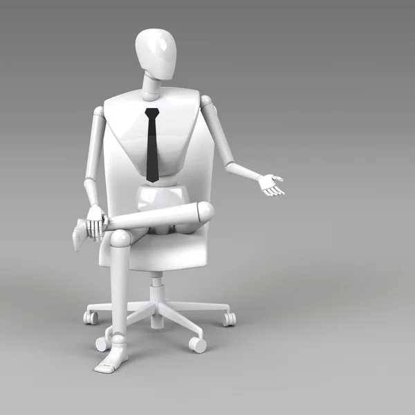 Businessman doll is sitting on chair — Stock Photo, Image