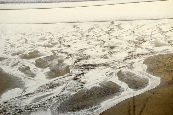 Padrão de água na areia — Fotografia de Stock