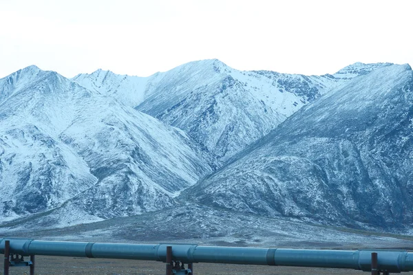 Oil pipeline with mountain — Stock Photo, Image