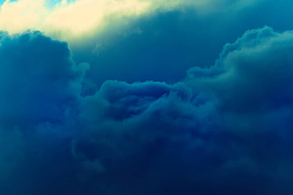Sky with dark storm clouds. The approach of the hurricane and bad weather. 