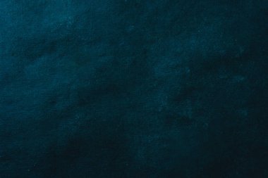 Kaba el sanatları kağıdından yapılmış soyut bir arka plan. Koyu mavi tasarım için boş yüzey