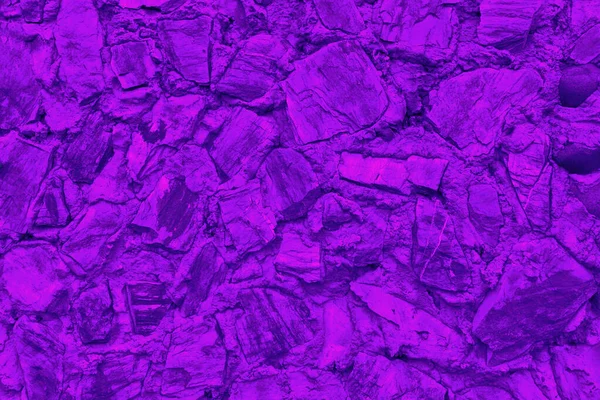 Absztrakt háttér sok nagy kövek. Az üres kőfelület lila színű.. — Stock Fotó