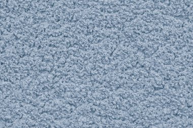 Sert alçı desenli yumuşak pastel rengin katı arkaplanı. 