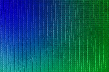 Arka plan yeşil-mavi. Güzel bir dokusu olan boş ve düz bir yüzey. Bilgi için moda arkaplanı.