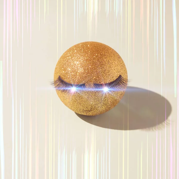 Stylish cover for a new music album. Golden ball with false eyelashes and highlights in the eyes. Abstract background
