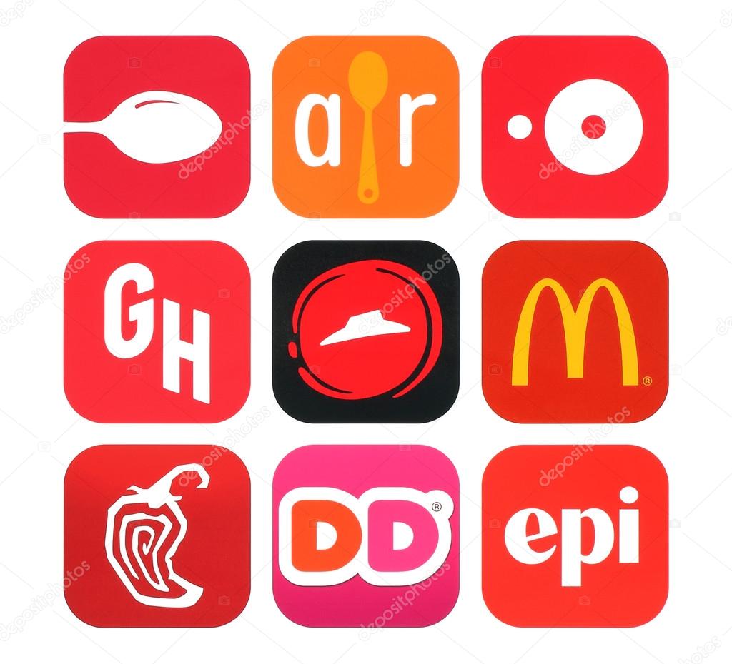 Kiev, Ukraine - February 26, 2016: Collection of popular food icons printed on paper: Urbanspoon, Allrecipes Dinner Spinner, Chipotle, Dunkin' Donuts, McDonald's, Open Table and other