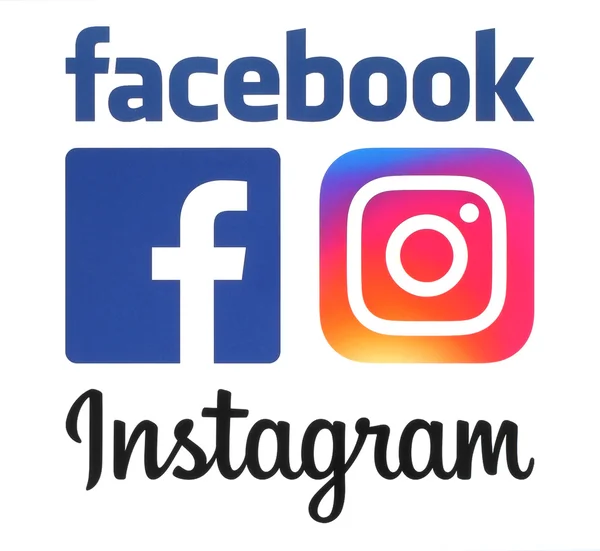 Nuevos logotipos de Instagram y Facebook impresos en papel blanco — Foto de Stock