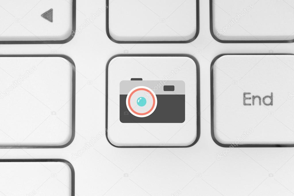 Keyboard button with a camera