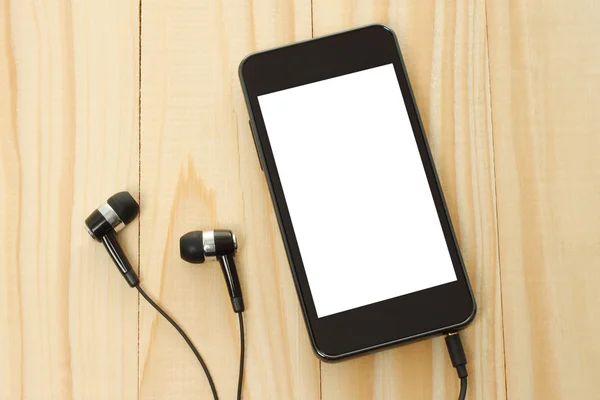 Smart phone with headphones — Stock Photo, Image