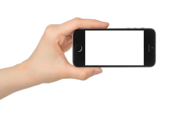 Ręka trzyma iphone 5s przestrzeni szary — Zdjęcie stockowe
