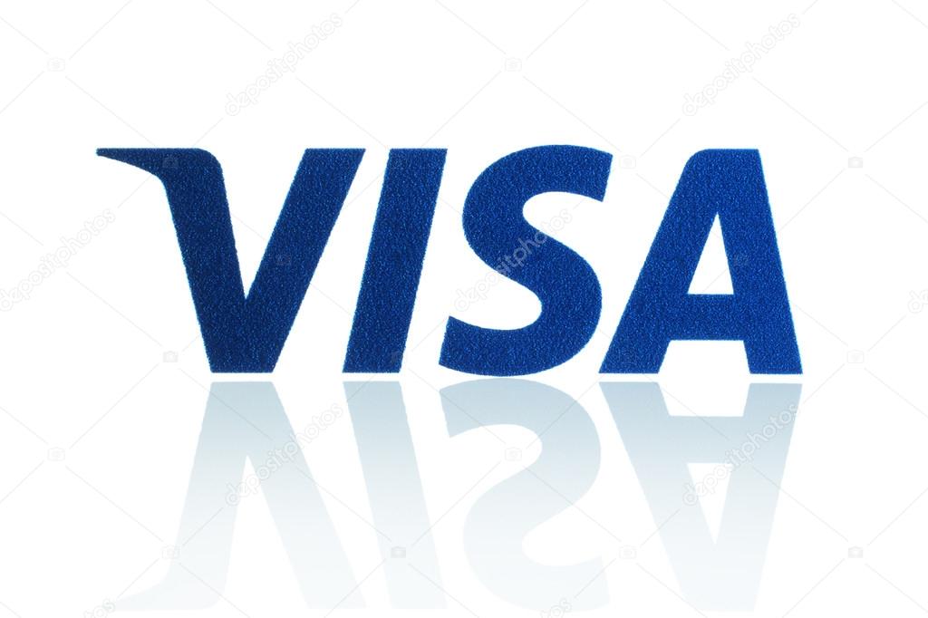 KIEV, UKRAINE - MARCH 21, 2015: Visa logo printed on paper and placed on white background. Visa is an American multinational financial services corporation.