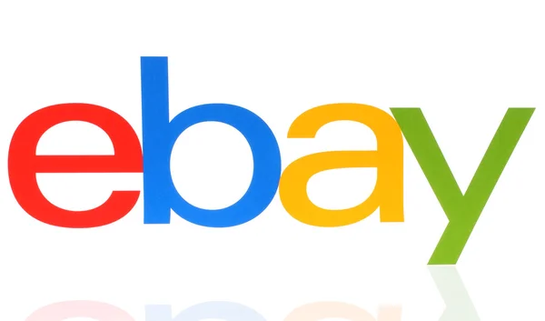 EBay logotype printed on paper on white background — ストック写真