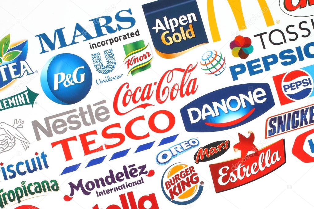KIEV, UKRAINE - MAY 07, 2015:Collection of popular food logos companies printed on paper:Coca-Cola, Mars, Kraft, Pepsi, McDonald's, Nestle, Tesco and others