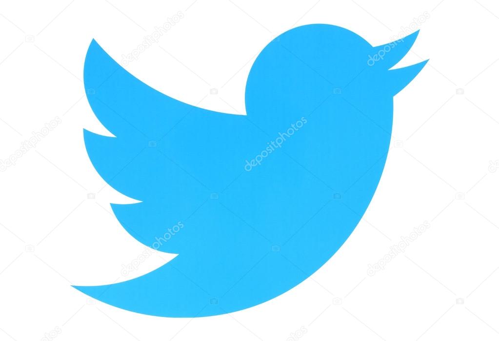 KIEV, UKRAINE - MAY 26, 2015:Twitter logotype bird printed on paper. Twitter is an online social networking service that enables users to send and read short messages