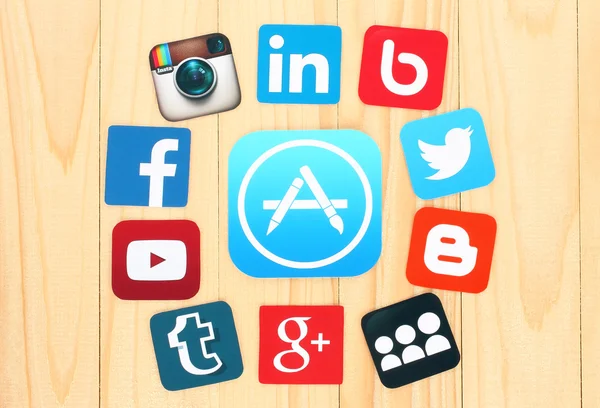 Around AppStore icon are placed famous social media icons — 스톡 사진