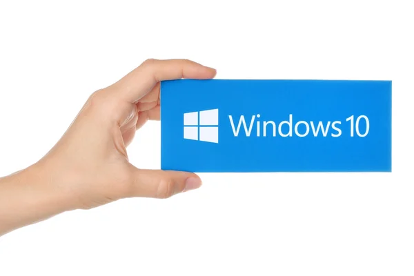 Hand holds Windows 10 logotype printed on paper — Stockfoto