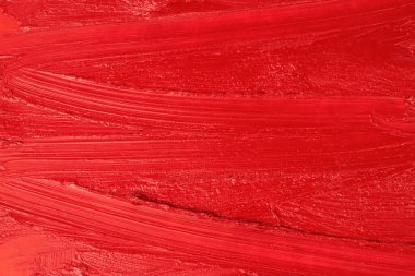 Lekeli kırmızı dudak parlatıcısı arka plan, desen yakın plan