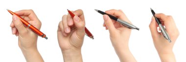 Şeffaf bir arkaplanda el ele tutuşan tükenmez kalem seti. Yazı, iş ve yaratıcı projeler için ofis kolajı