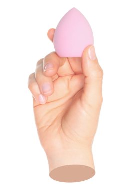 Kadın eli kozmetik sünger tutuyor, şeffaf bir arka plan, kozmetik ve çehre kavramı ile izole edilmiş. Çağdaş sanat