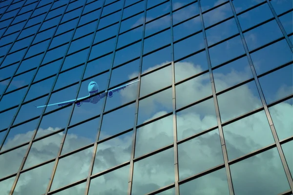 Airplane reflect on building glass — Stock Photo, Image