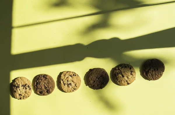 Biscuits on yellow background — Stock Photo, Image