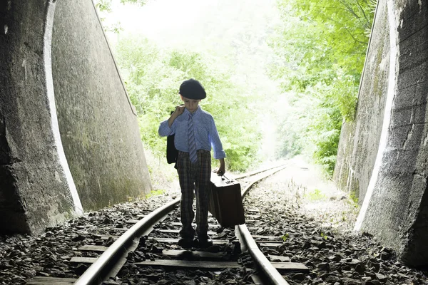 Child walking on railway road — Stock Photo, Image