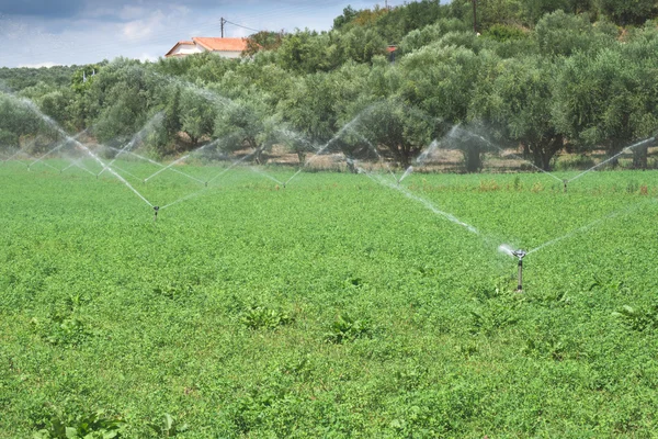Irrigation systems and sky — Stock Photo, Image