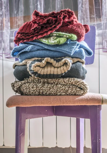 Winter clothes stacked — Stock Photo, Image
