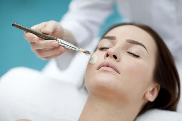 Woman receiving spa treatment